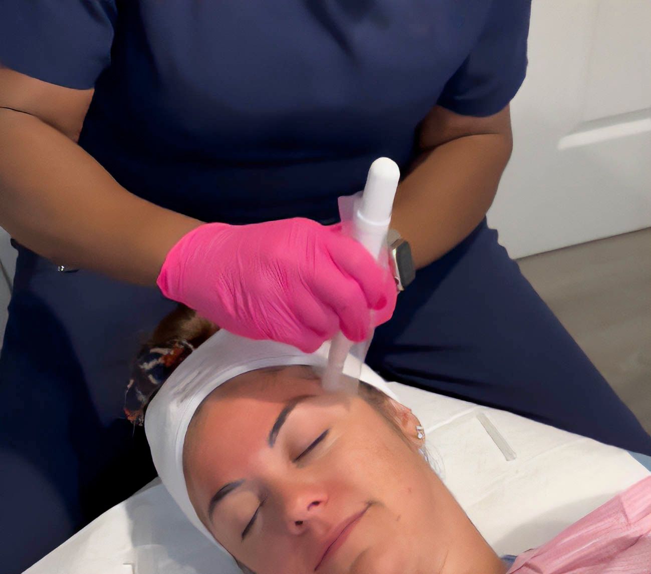 Stephanie treats a patient in her office in Madison, NJ